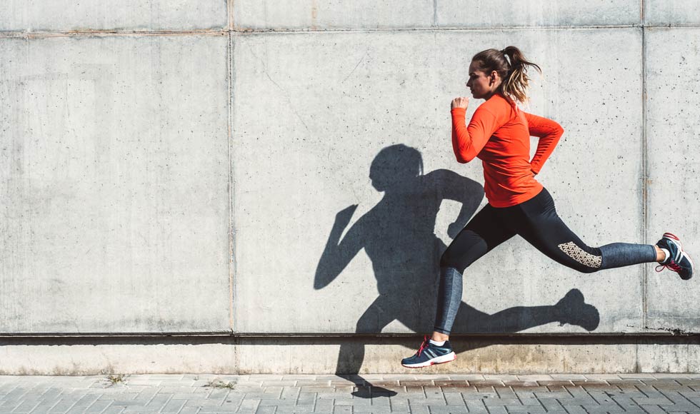 Woman running outdoors in the city