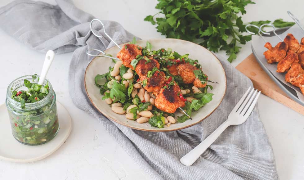Chimichurri chicken skewers and white bean salad