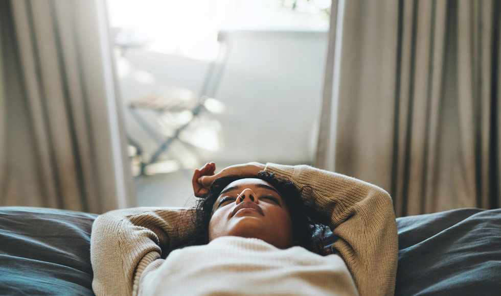 Young woman napping during the day