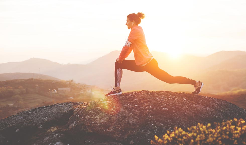 Woman stretching outdoors